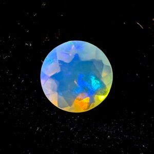 2.28 Ct Natural Multi-Color Welo
Opal Flash Fire Round Cut